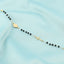 Bratara-Placata-cu-Aur-14k-Cruce-cu-Pietre-Negre-tip-Rozariu